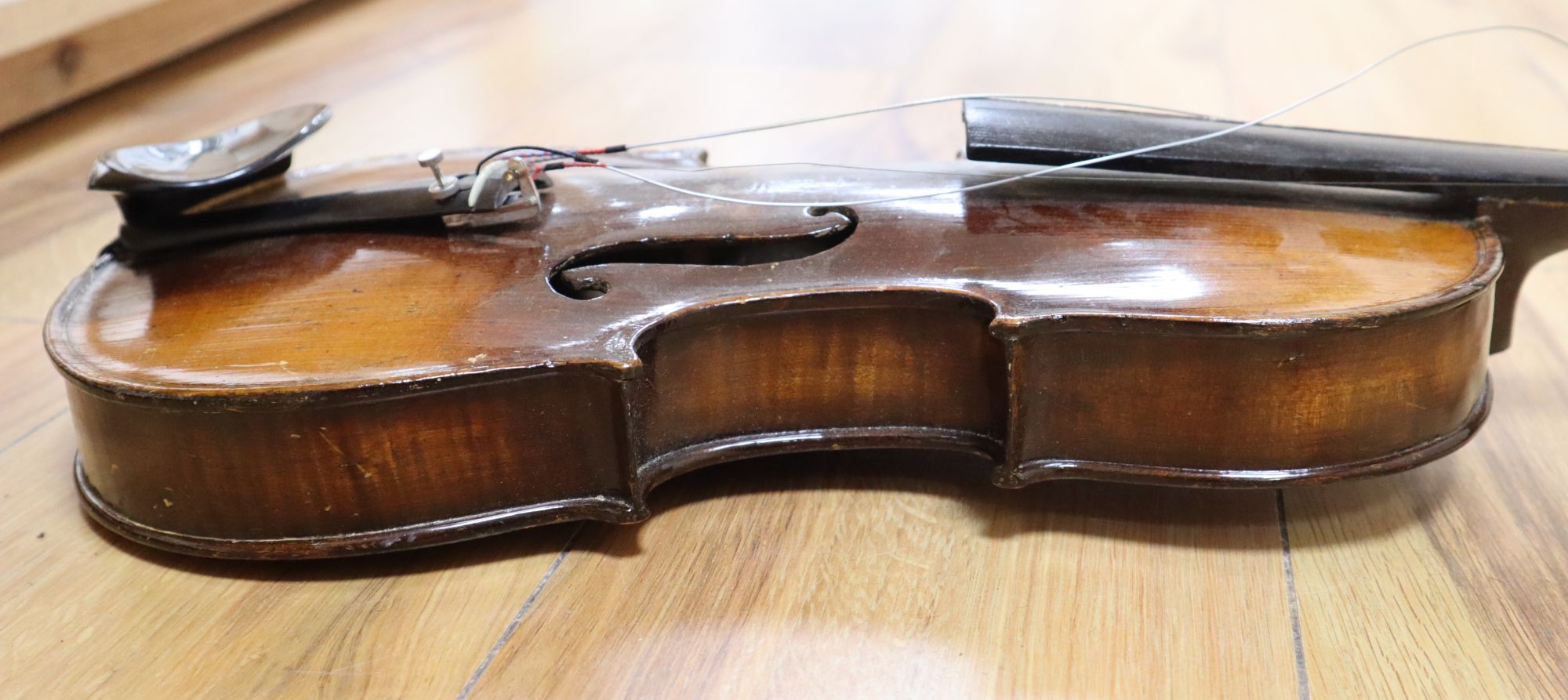 A violin labelled W Placht & Co, 58cm, cased